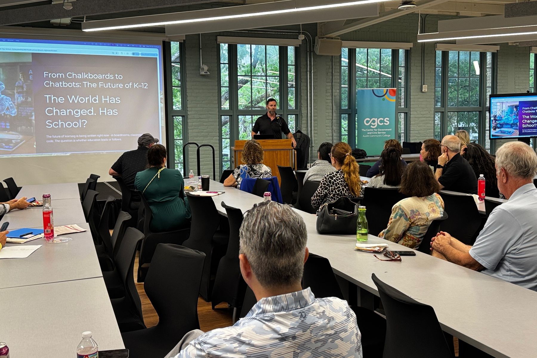 A speaker presenting at an Austin AI Alliance meetup